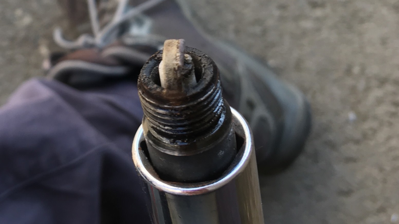 Sorry for the bad focus on this one, but notice how one side of the ground electrode is much more fouled than the other